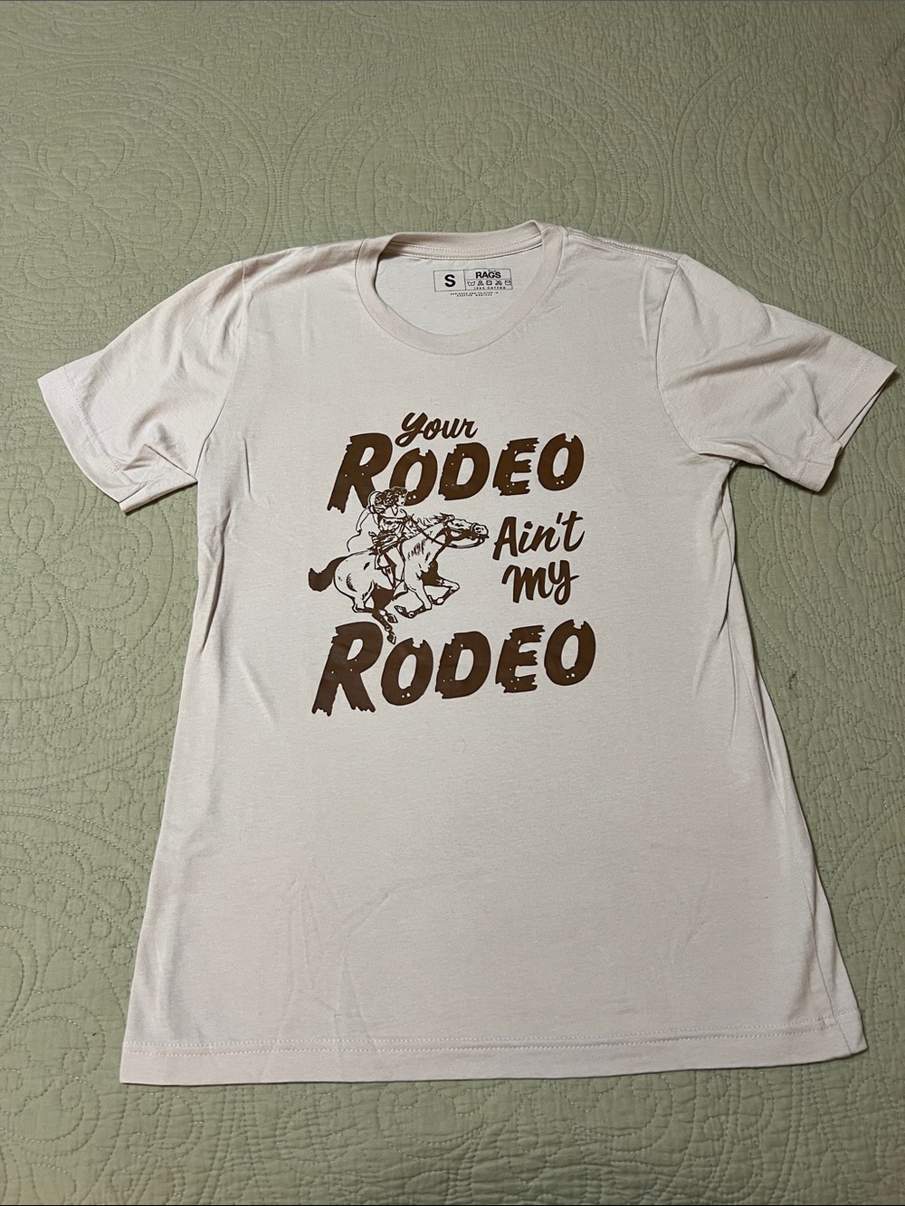 Your Rodeo Ain't My Rodeo Cream Graphic Tee